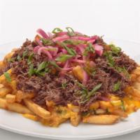Short Rib Poutine · Fries, jalapeño cheese sauce, braised short rib, beer gravy, pickled red onions, and green o...