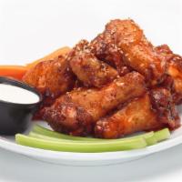 Oggi’S Famous Wings · Seasoned wings tossed in one of our signature sauces and sprinkled with toasted sesame seeds...