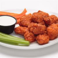 Boneless Wings · All white meat boneless wings tossed in one of our signature sauces, sprinkled with toasted ...