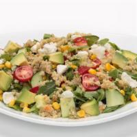 Quinoa, Arugula & Avocado Salad · Protein-packed quinoa, tossed with fresh arugula, cucumber, feta cheese, avocado, cherry tom...