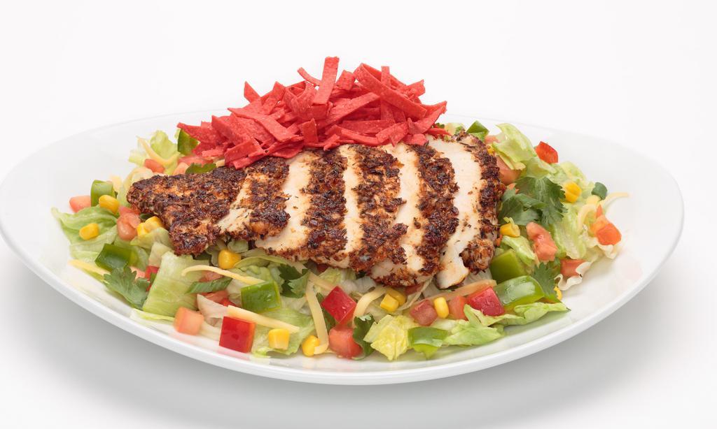 Blackened Santa Fe Chicken Salad · Spicy. Chopped iceberg lettuce tossed with sweet corn, red bell peppers, green onions, tomatoes, fresh cilantro, and our homemade Santa Fe dressing. Topped with spicy blackened all-natural chicken breast, Gouda cheese, and crunchy tortilla strips.