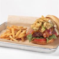 Baecation Burger · Topped with cheddar, crispy
Applewood smoked bacon, crispy fried jalapeño, sliced tomato, an...