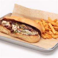 Philly Cheesesteak · Layers of thinly sliced steak grilled with red onions, green bell peppers and American Swiss...