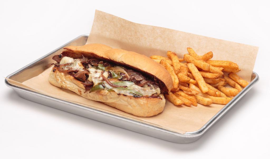 Philly Cheesesteak · Layers of thinly sliced steak, grilled with red onions, green bell peppers and American Swiss cheese. Served on a warm hoagie roll.