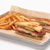 Chicken Club Sandwich · Marinated all natural chicken breast, provolone cheese, crispy bacon, sliced avocado, lettuc...