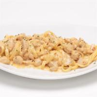 Chicken Alfredo · Fettuccine with classic garlic, cream and cheese Alfredo sauce, topped with all natural gril...