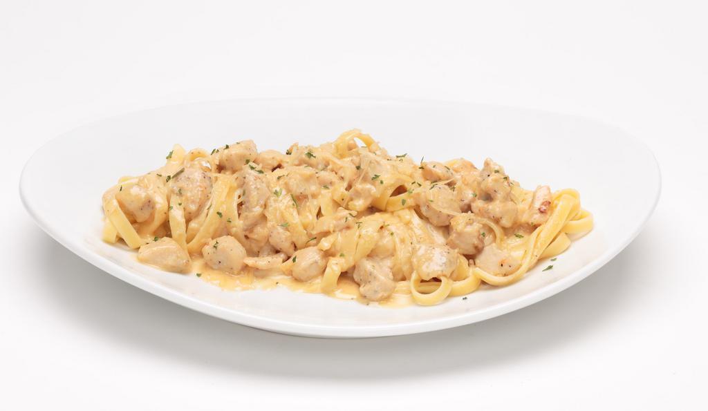 Chicken Alfredo · Fettuccine with our homemade garlic, cream, and Parmesan cheese alfredo sauce, topped with chicken breast and Parmesan cheese.