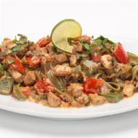 Chicken Tequila · Spicy. Marinated chicken breast, a touch of tequila, sautéed with red and green bell peppers...
