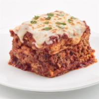 Homemade Lasagna · New. Imported lasagna noodles triple layered with seasoned Italian sausage, homemade marinar...