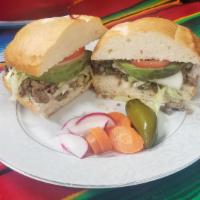 Tortas · Made with choice of meat, beans, lettuce, tomatoes, onions, avocado, jalapenos.