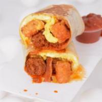 A. Carnivore Breakfast Burrito · 3 fresh cracked cage-free scrambled eggs, melted Cheddar cheese, smokey bacon, spicy chorizo...