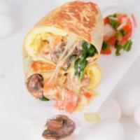 Veggie Breakfast Burrito
 · Flour tortilla with scrambled eggs, grilled tomatoes, mushrooms, onion, spinach, Swiss chees...