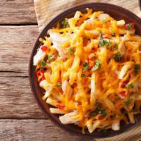 Chili Cheese Fries · Fresh made french fries topped with creamy cheese and hearty chili.