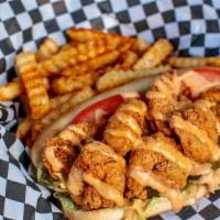 Shrimp Po' Boy With Fries · Deep fried jumbo shrimp, tomatoes, lettuce, and pickles between a perfect
crusted French bre...