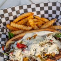 Kings Cheese Steak With Fries · Marinated tri-tip steak, bell peppers onion mix, and field greens between a
fresh hoagie rol...