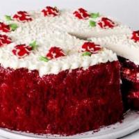 Slice Red Velvet Cake · Rich and red buttermilk cake with layers of cream cheese filling and frosting, decorated wit...