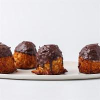 Chocolate Covered Macaroons · A golden mound of sweet coconut and ground almonds .  Dipped in a rich chocolate.
MADE WITH ...