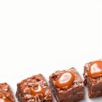 Sea Salt Caramel Brownie Bite · A creamy caramel filled Cordillera dark chocolate brownie topped with a touch of sea salt