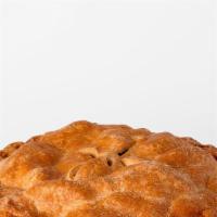 Slice Of Apple Pie · Pink Lady and Granny Smith apples piled high
and baked with cinnamon and nutmeg in a
double-...