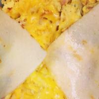 Caveman Wrap · Cage-free eggs, Applegate ham, cheddar & Monterey jack cheese, served in a coconut wrap [GF]