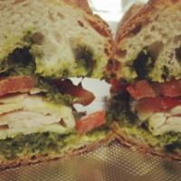 Chicken Pesto Sandwich (Grilled) · sliced chicken breast, parmesan cheese & tomato with house made pesto on a French baguette