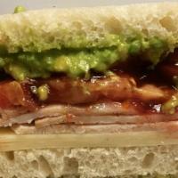 Give Thanks  Sandwich · Diestel Farms turkey, swiss cheese, avocado & tomato with cranberry sauce on sourdough