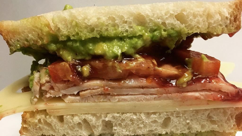 Give Thanks  Sandwich · Diestel Farms turkey, swiss cheese, avocado & tomato with cranberry sauce on sourdough