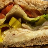 Spicy Turkey Sandwich (Grilled) · Diestel Farms turkey, swiss cheese, tomato, pepperoncinis & romaine lettuce with stone groun...