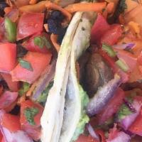 2 Vegan Tacos · Sautéed sweet potato, black beans, red onions, carrots, mushrooms & avocado, topped with gar...