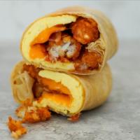 Classic Breakfast Burrito · Scrambled Eggs, Potatoes & Cheddar Cheese