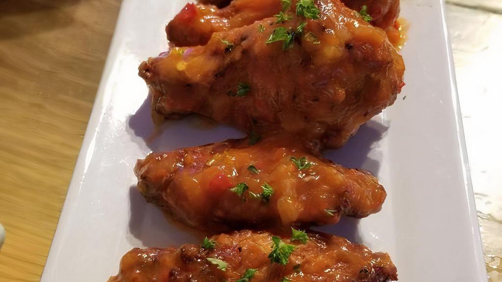 Wings · Pound of wings deep fried with your choice of sauce.