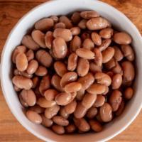 Beans (Frijoles) · Pinto beans, made fresh daily in house, lightly seasoned.
