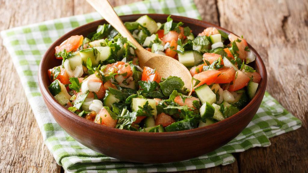 Large Shirazi Salad · Chopped tomatoes, cucumbers, onions and fresh squeezed lemon juice.