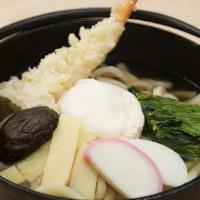 Nabeyaki Udon · Special pot cooked noodles in broth with shrimp tempura, poached eggs, fish cake kamaboko, s...