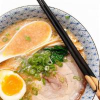 White Tonkotsu · Ramen noodle, egg, bones broth, green onion, bamboo.