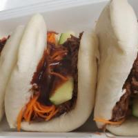 Pork Belly Baos ( 3 Pieces) · Pork belly, hoisin sauce , cilantro, wrap on Taiwanese bao buns