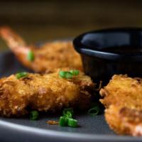 Coconut Shrimp · Coconut breaded shrimp served with sweet and sour sauce.