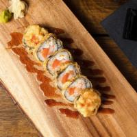 *Las Vegas Roll · Salmon, crab mix, cream cheese, lightly tempura battered and topped with eel sauce.