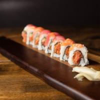 *Tiger Roll · Spicy tuna, cucumber and avocado topped with tuna, and salmon.