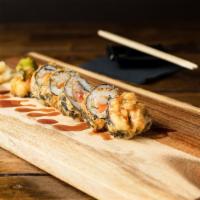 *Fuku In Vegas Roll · Tuna, salmon, yellowtail, cucumber and cream cheese, lightly tempura battered and topped wit...