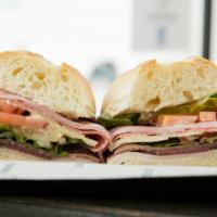 Po' Boy™ (Toasted Roll) · Turkey, Roast beef, Ham, Salami, Swiss cheese, Green leaf lettuce, Tomatoes, Red Onions, Pic...