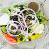 Greek Feta Salad · Mixed greens, Cucumbers, Tomatoes, Red onions, Capers, Oregano, Black olives, Feta cheese, a...