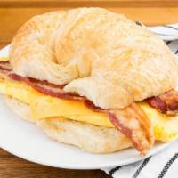 Bacon, Egg & Cheese · Bacon, Egg, & Cheese melted into a fresh baked butter croissant.