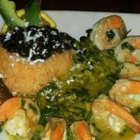 Jalapeño Shrimp · Large shrimp, spinach, jalapeno, pesto, alfredo sauce with rice and black beans.