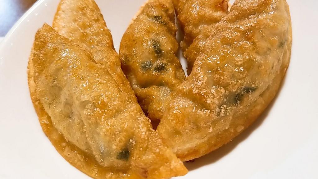 Gyoza · Deep fried vegetable dumplings.