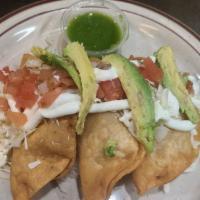 Tacos Dorados De Camarón · Camarones, jitomate, cebolla, cilantro, repollo picado, mayonesa, crema, jitomate y aguacate...