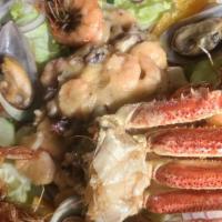 Botana De Mariscos · Camarones, pulpo y abulon y salsa al gusto  / shrimp, octopus and abalone choice of sauce. c...