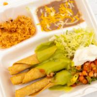 Taquitos Combo Plate · Three shredded beef taquitos. Includes beans and rice.