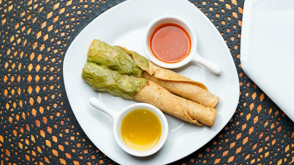 Taquitos · Two Beef Taquitos with Guacamole