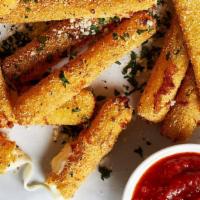 Mozzarella Sticks · Breaded and fried cheese sticks served with our signature marinara sauce.